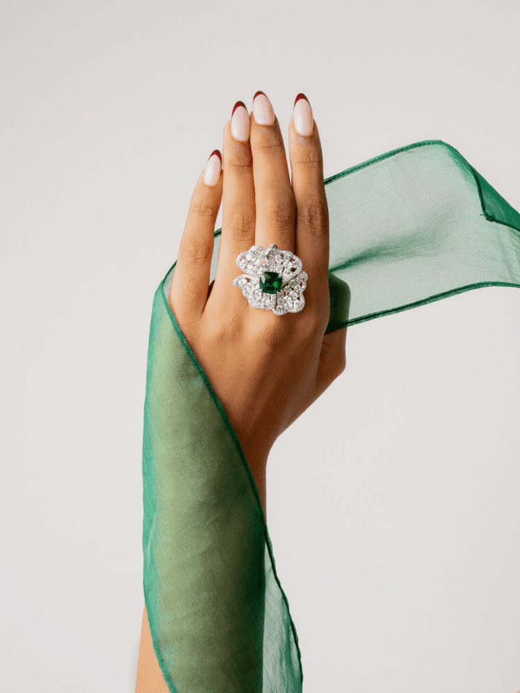 Image may contain Body Part Finger Hand Person Accessories Diamond Gemstone Jewelry Ring and Nail